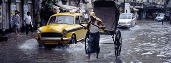 Cars and a rickshaw on the street Calcutta West Bengal India Canvas Art - Panoramic Images (36 x 13)