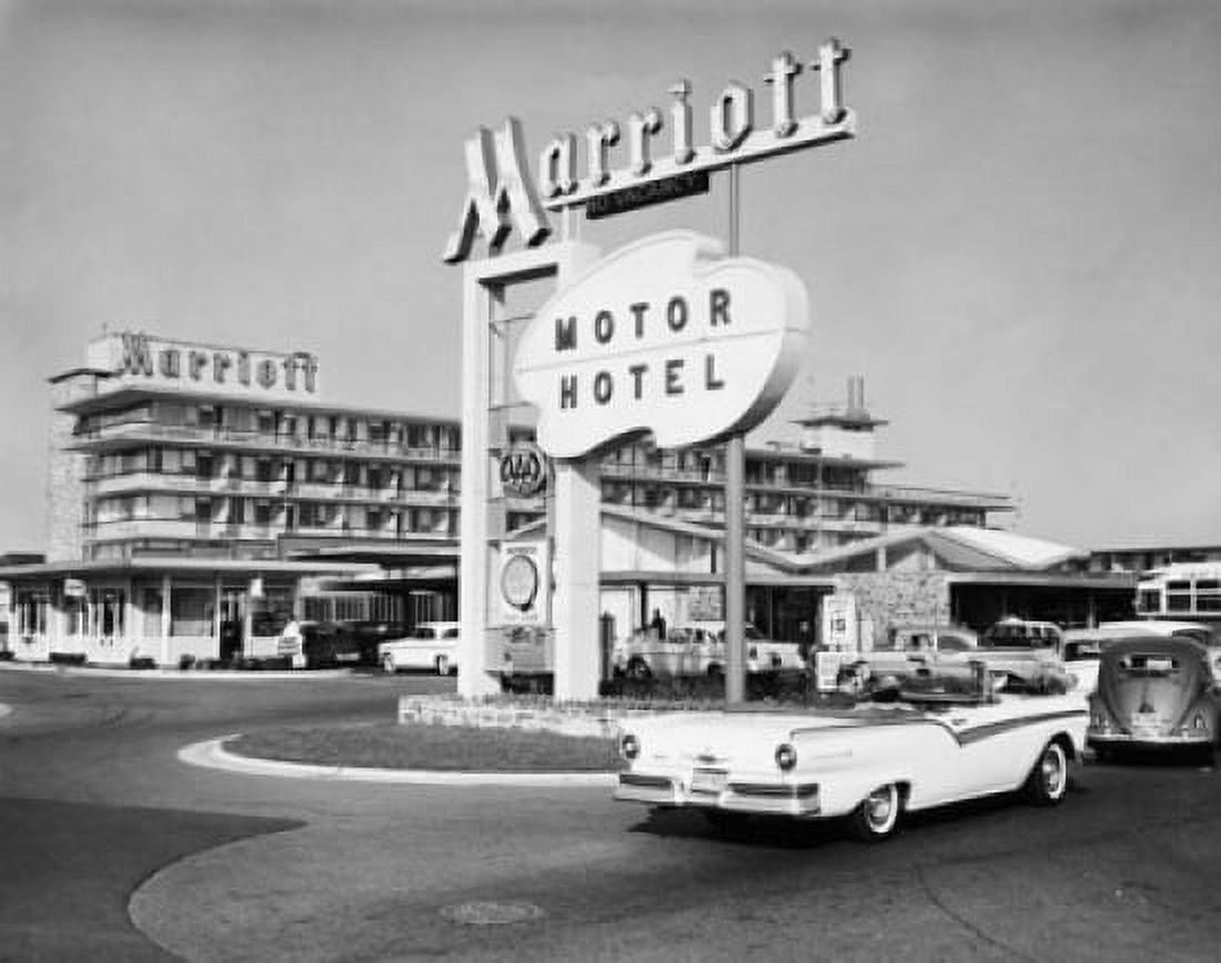 Cars in a parking lot of a hotel Canvas Art - (24 x 36)