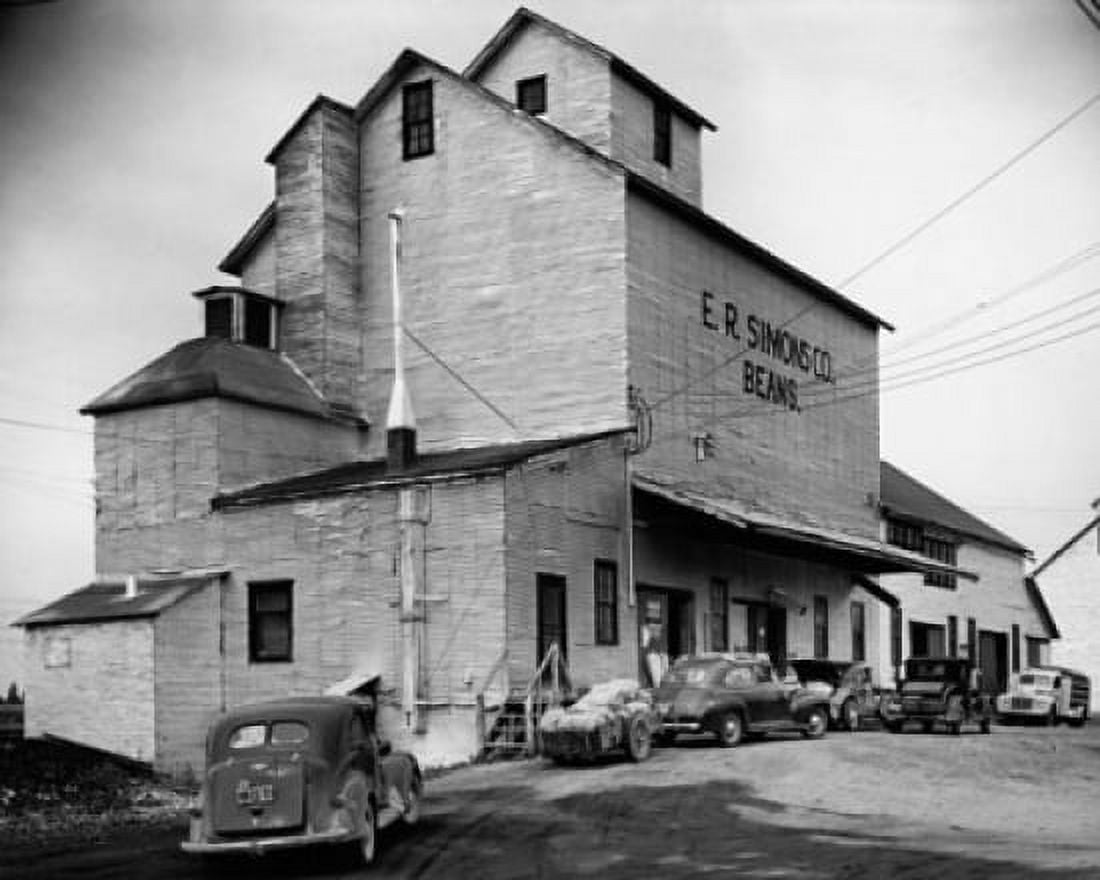 Cars in front of a building ER Simons Co Bean Plant Coleman Michigan USA Canvas Art - (18 x 24)