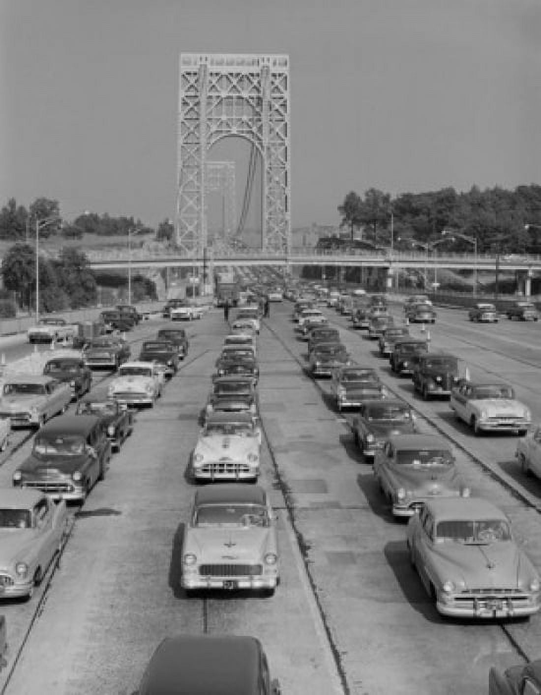 Cars on urban motorway with suspension bridge in background Canvas Art - (24 x 36)