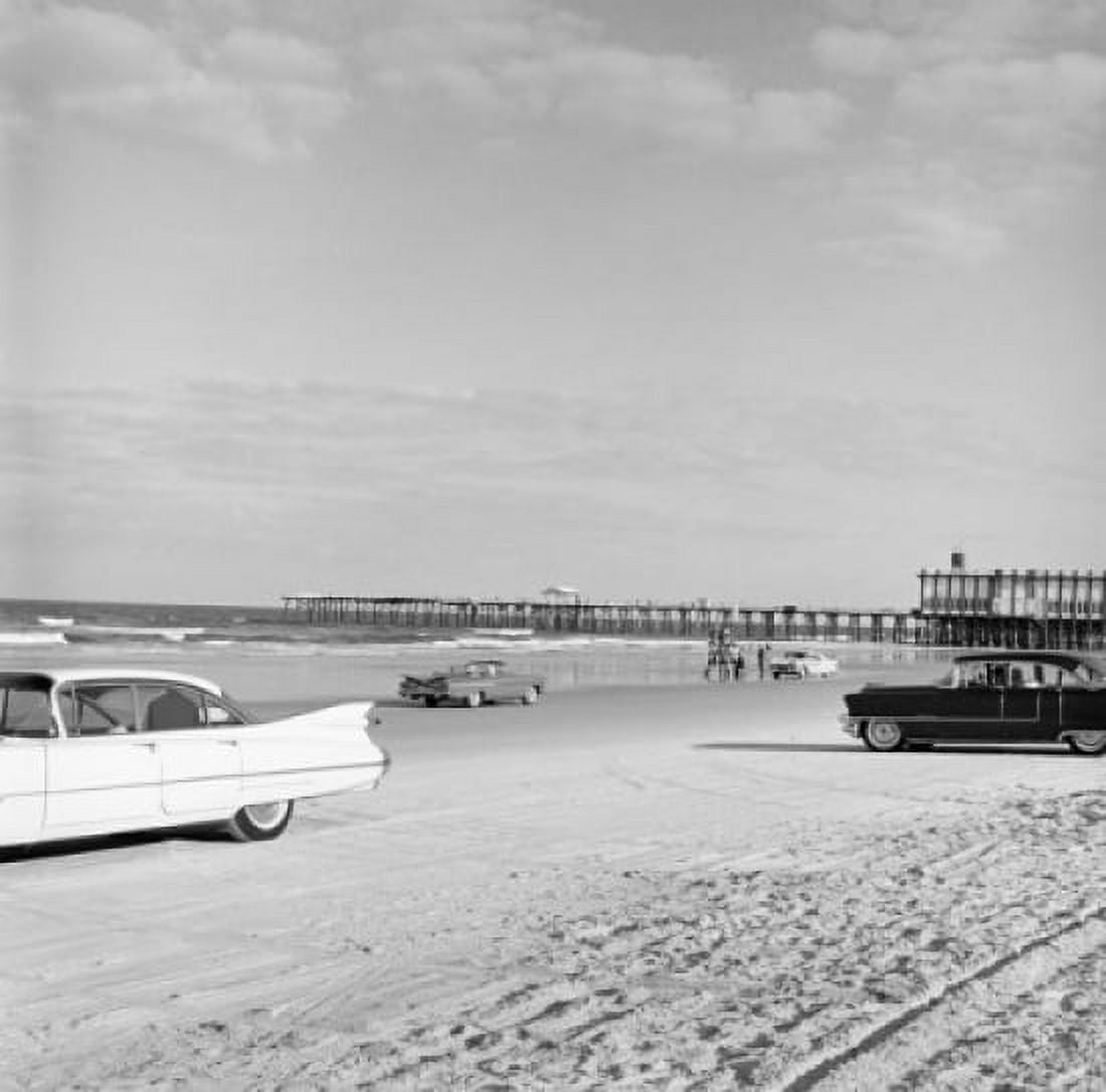 Cars parked on beach pier in background Canvas Art - (18 x 24)