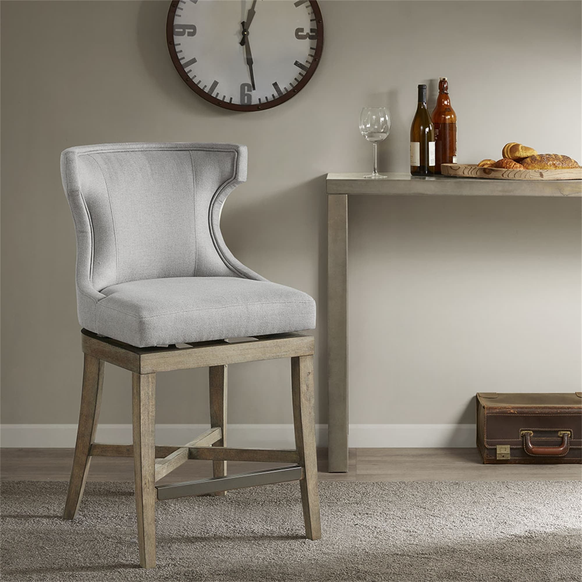 Elegant Light Grey Wingback Swivel Counter Stool with Bronze Accents