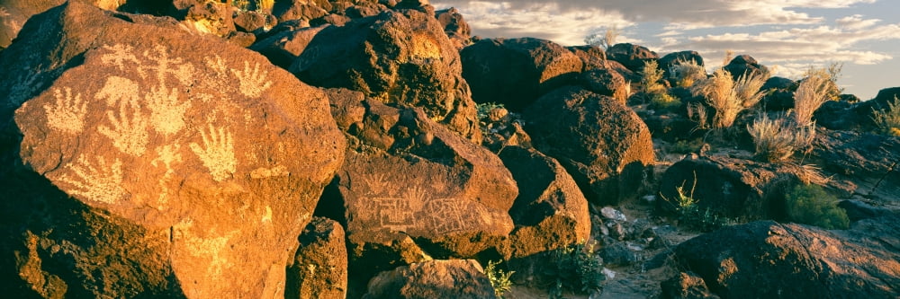 Carvings on rocks at Petroglyph National Monument Albuquerque New Mexico USA Canvas Art - Panoramic Images (6 x 18)