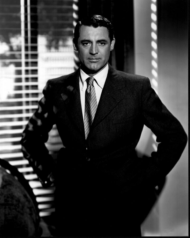 Cary Grant In Front Of Window With Hands On Hips Black And White Photo ...