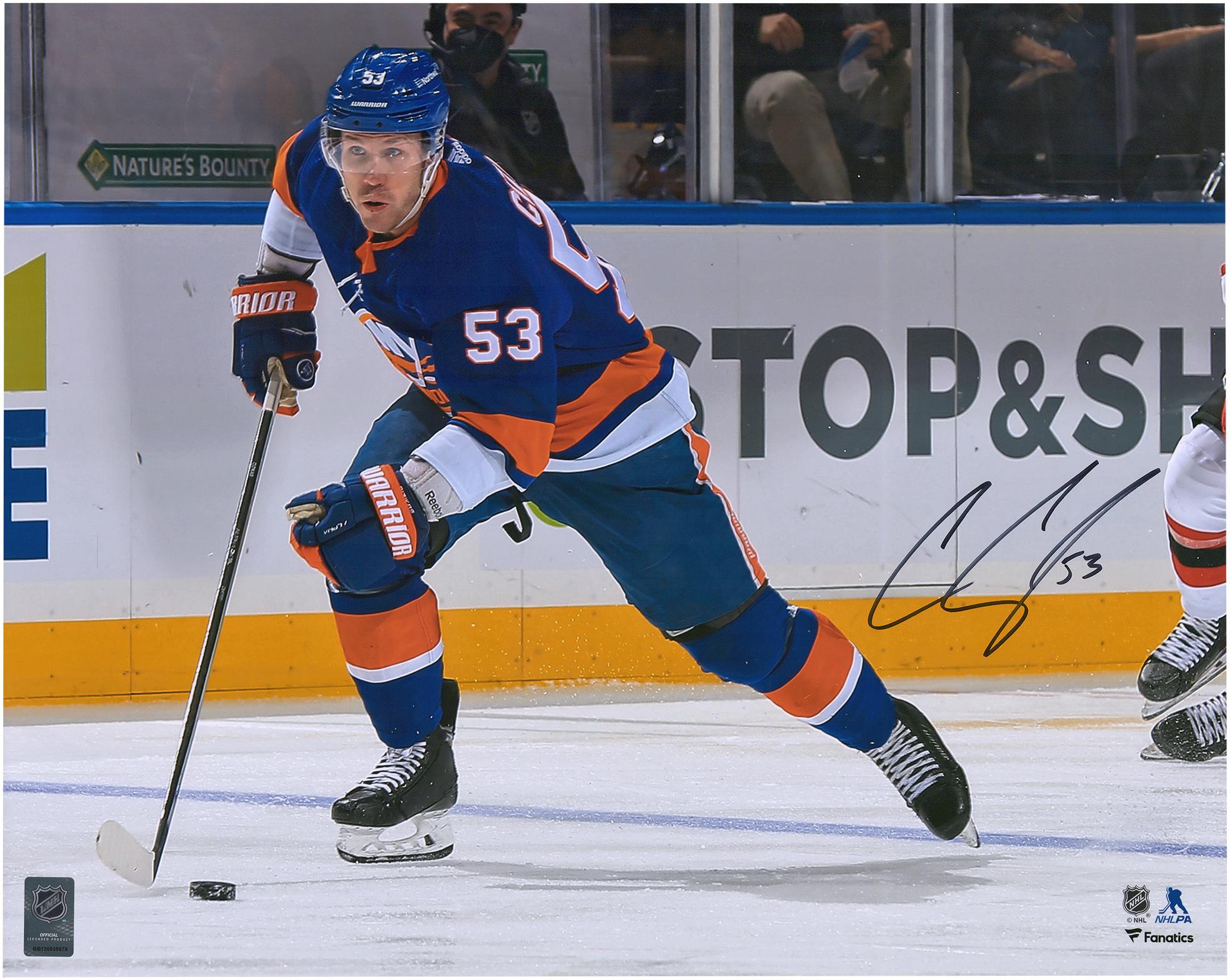 Casey Cizikas New York Islanders Autographed 16" x 20" Blue Jersey Skating with Puck Photograph - Fanatics Authentic Certified
