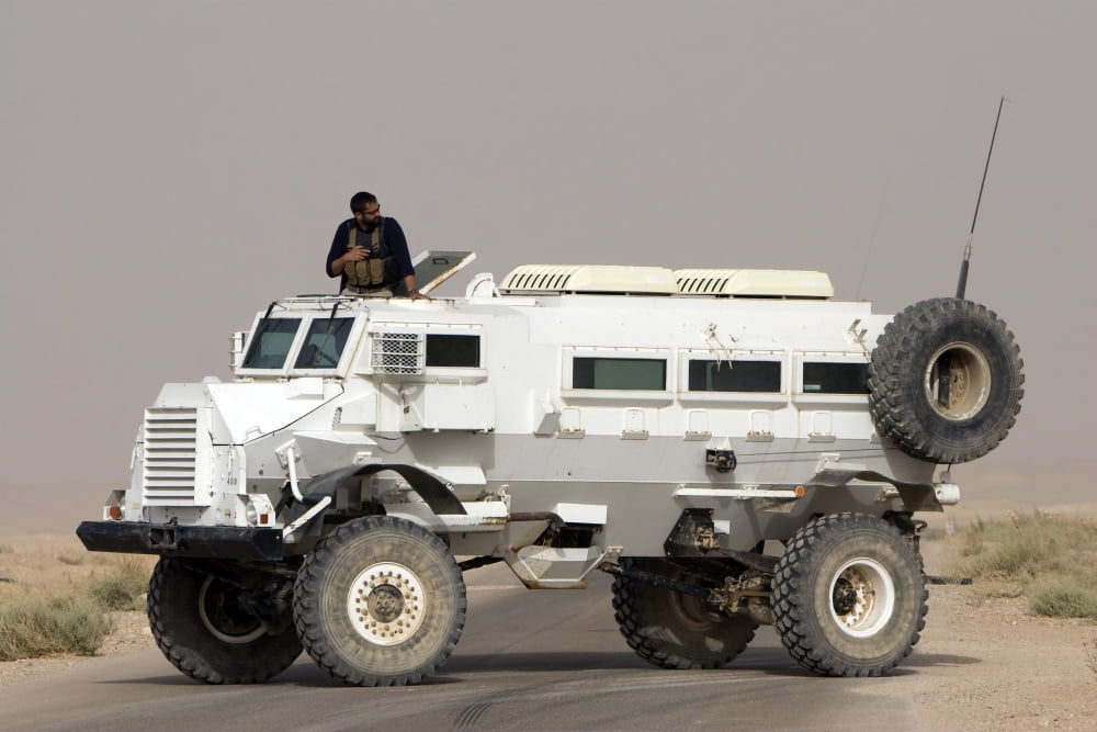 Casper armored vehicle blocks the road to prevent vehicles from entering the blast zone Canvas Art - Terry MooreStocktrek Images (17 x 12)