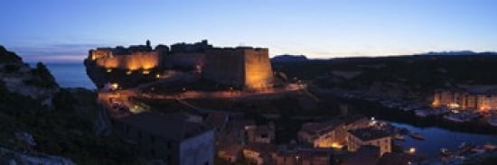 Castle lit up at night Bonifacio Harbour Corsica France Canvas Art - Panoramic Images (36 x 12)