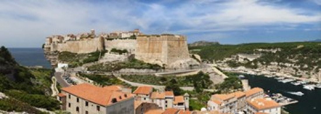 Castle on a hill Bonifacio Harbour Corsica France Canvas Art - Panoramic Images (18 x 7)