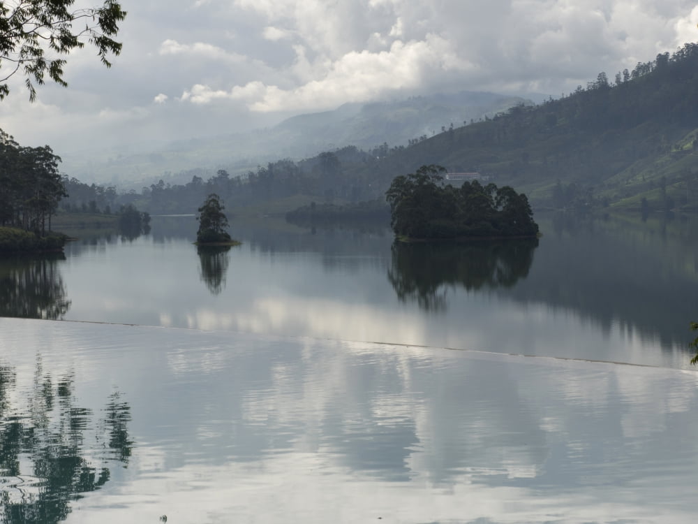 Castlereigh Reservoir seen from edge of infinity pool at Summerville Bungalow of Ceylon Tea Trails Nuwara Eliya Central Province Sri Lanka Canvas Art - Panoramic Images (12 x 16)