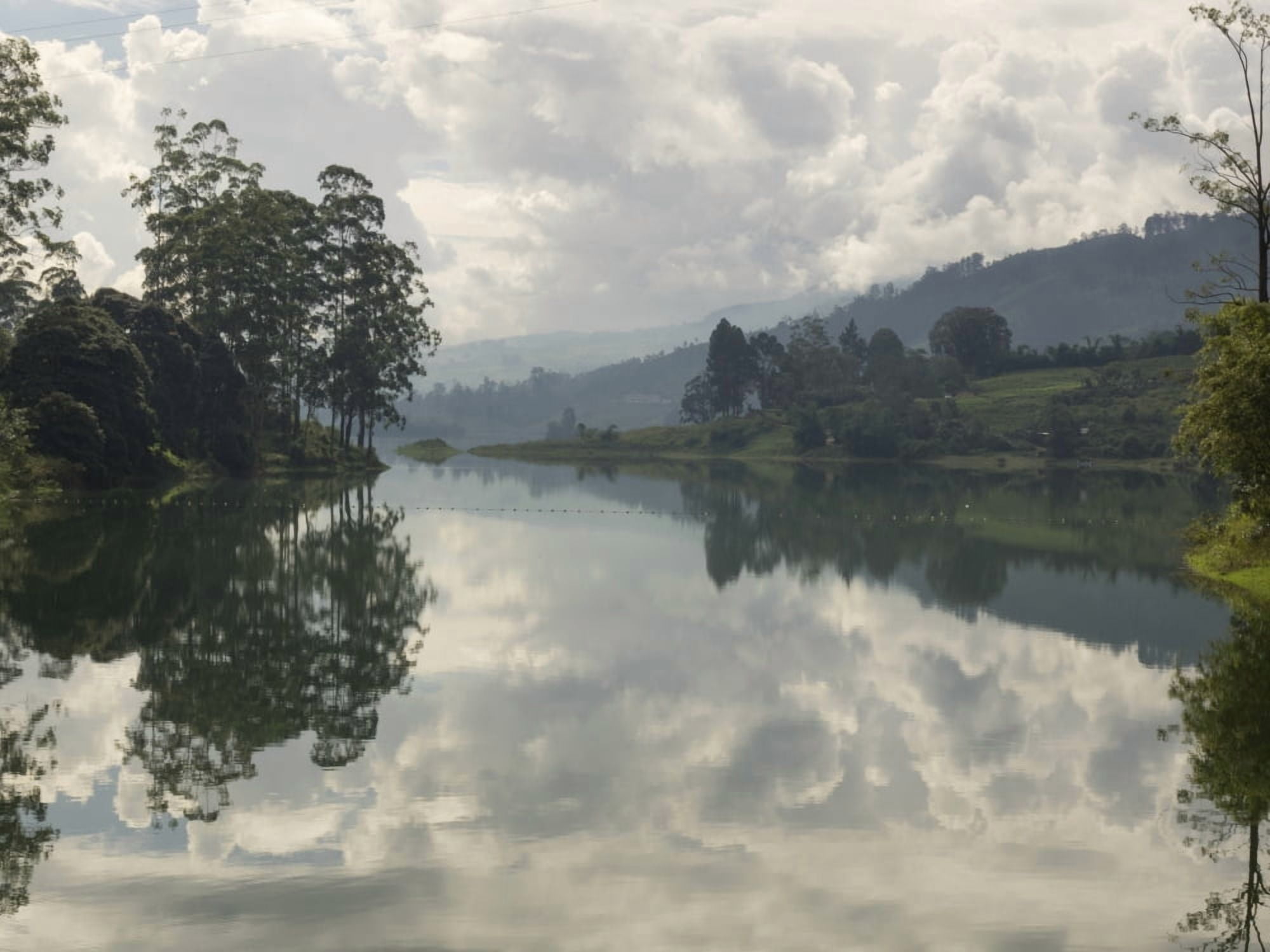 Castlereigh Reservoir seen from road along top of dam at hazy morning Nuwara Eliya Central Province Sri Lanka Canvas Art - Panoramic Images (12 x 16)