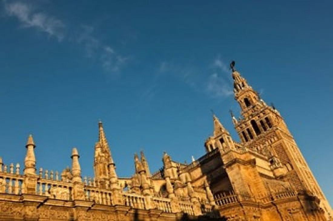 Cathedral And Giralda Tower Seville Spain Canvas Art - Walter Bibikow DanitaDelimont (38 x 25)