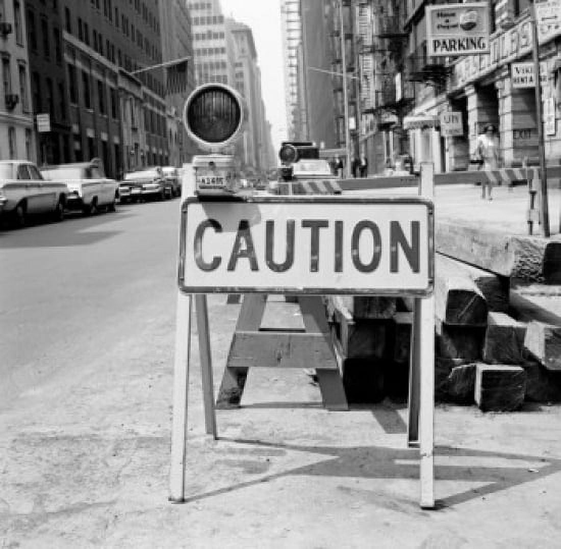 Caution sign on city street Canvas Art - (18 x 24)