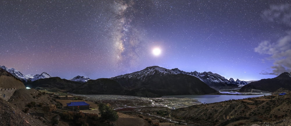 Celestial sky with Milky Way galaxy above Laigu Glacier in Tibet Canvas Art - Jeff DaiStocktrek Images (42 x 19)