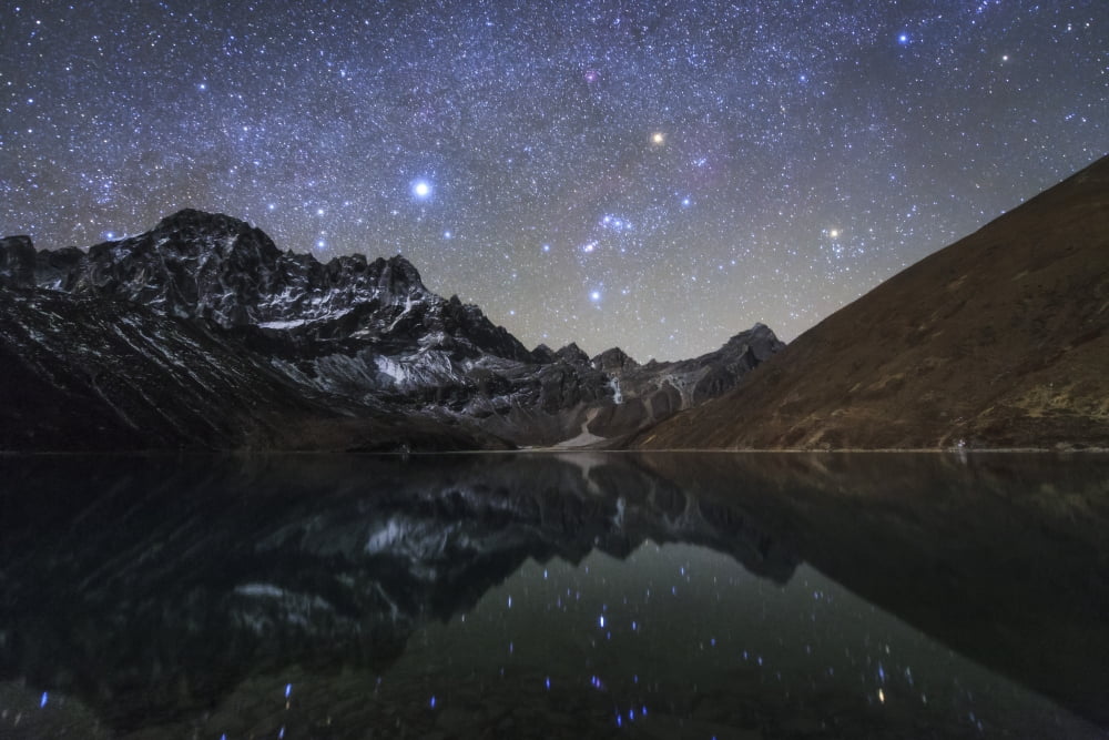 Celestial sky with Sirius Orion and Aldebaran shining bove Pharilapche Peak in Nepal Canvas Art - Jeff DaiStocktrek Images (34 x 23)