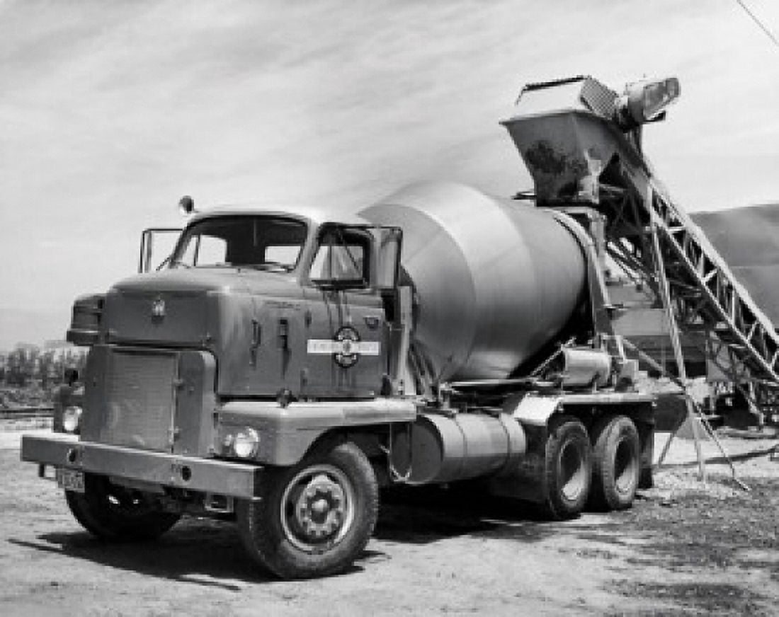 Cement being poured in to a cement truck Canvas Art - (24 x 36)