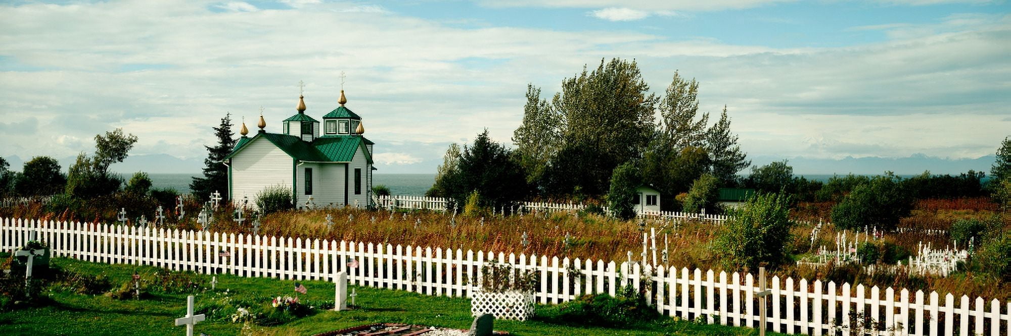 Cemetery and a church Russian Orthodox Church Ninilchik Alaska USA Canvas Art - Panoramic Images (6 x 18)