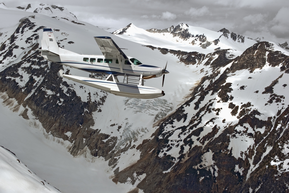 Cessna Caravan Amphibian Seaplane Flying Through The Coast Mountains British Columbia Canada Canvas Art - Brechin Maclean Design Pics (38 x 24)