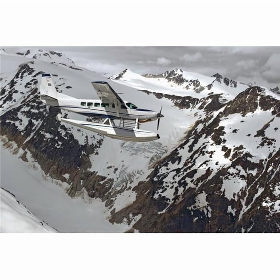 Cessna Caravan Amphibian Seaplane Flying Through The Coast Mountains; British Columbia Canada Poster Print