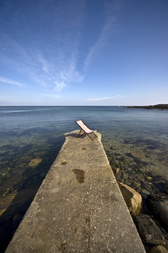Chair On Pier Northumberland England Uk Canvas Art - John Short Design Pics (24 x 36)