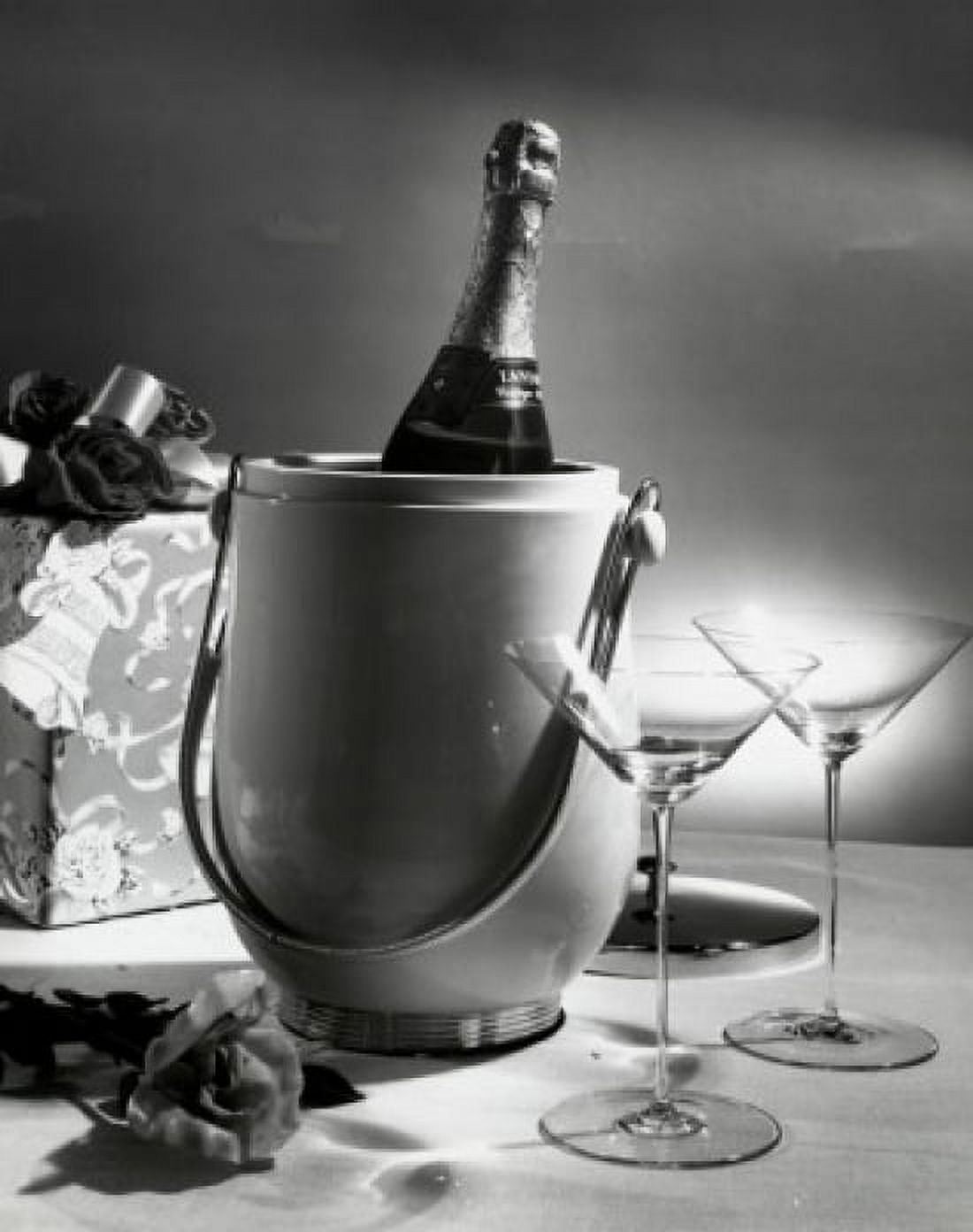 Champagne bottle in an ice bucket with two empty martini glasses beside it Canvas Art - (24 x 36)