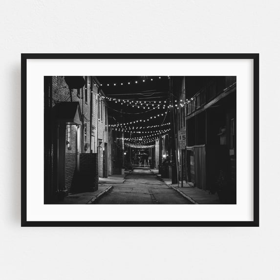 Chapel Street String Lights B&W - Baltimore Maryland Photography Black and White Street Photography Nightlife Cityscape Architecture Vintage Night Sky Black Framed Wall Art Print 5 x 7 inches