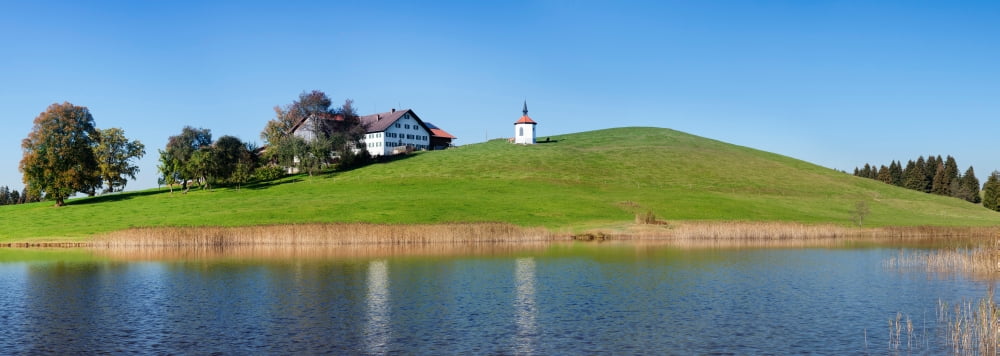 Chapel at Hergratsrieder See Lake near Fussen Allgau Ostallgau Bavaria Germany Canvas Art - Panoramic Images (27 x 9)