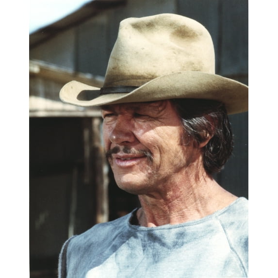Charles Bronson smiling in Blue Shirt and Brown Hat Photo Print (24 x 30)