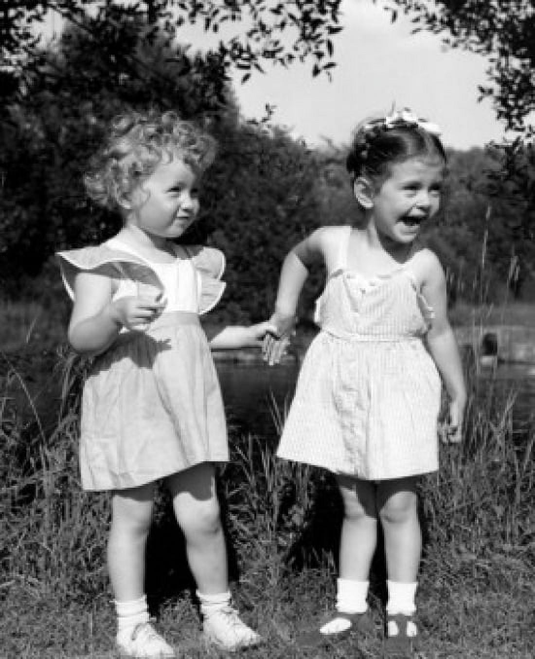 Cheerful girls in white dresses standing outdoors Canvas Art - (18 x 24)