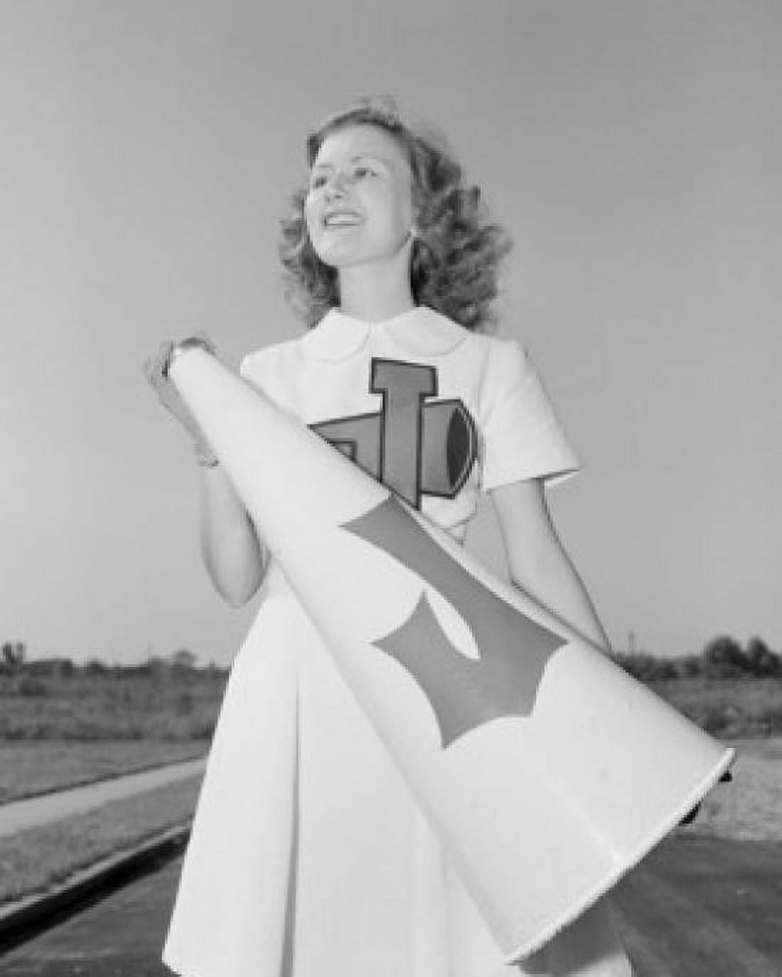 Cheerleader carrying megaphone Canvas Art - (18 x 24)