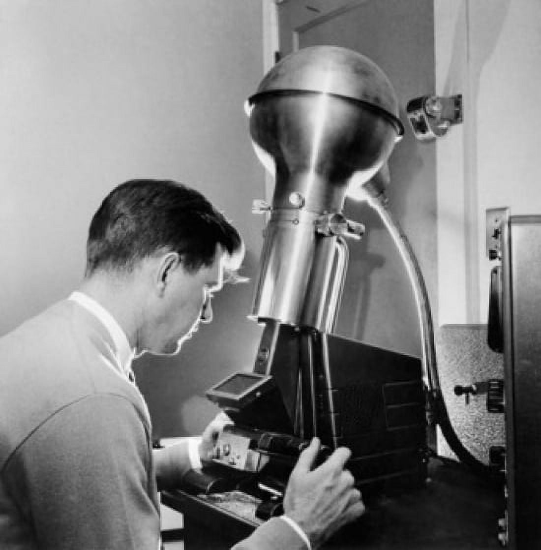 Chemist using an electron microscope in a laboratory Canvas Art - (24 x 36)