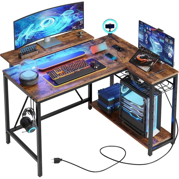 Chenshuoo 42-Inch L-Shaped Gaming Desk with Charging & LED, Rustic Brown | Charging 2AC+USB+Type-C, RGB LED 7 Colors/20 Modes, Reversible Storage Shelves, 3D Carbon Fiber, Headphone Hook, Small Space