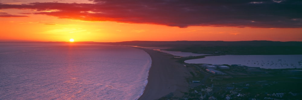 Chesil beach at sunset Portland Dorset England Canvas Art - Panoramic Images (36 x 12)