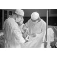 thumbnail image 1 of Chicago Surgery 1941. Nsurgeons Performing A Hernia Operation At Provident Hospital One Of The Few African-American, 1 of 3