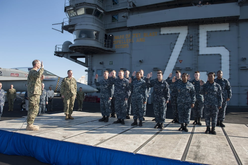 Chief of Naval Operations performs a re-enlistment ceremony Canvas Art - Stocktrek Images (35 x 23)