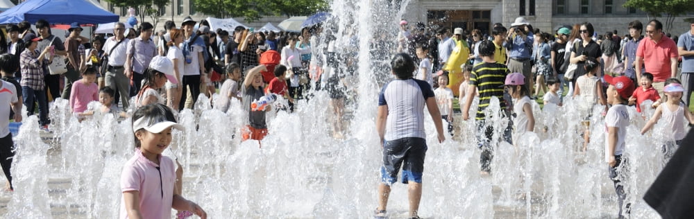 Children playing in water sculpture at Seoul City Hall Park Seoul South Korea Canvas Art - Panoramic Images (27 x 9)