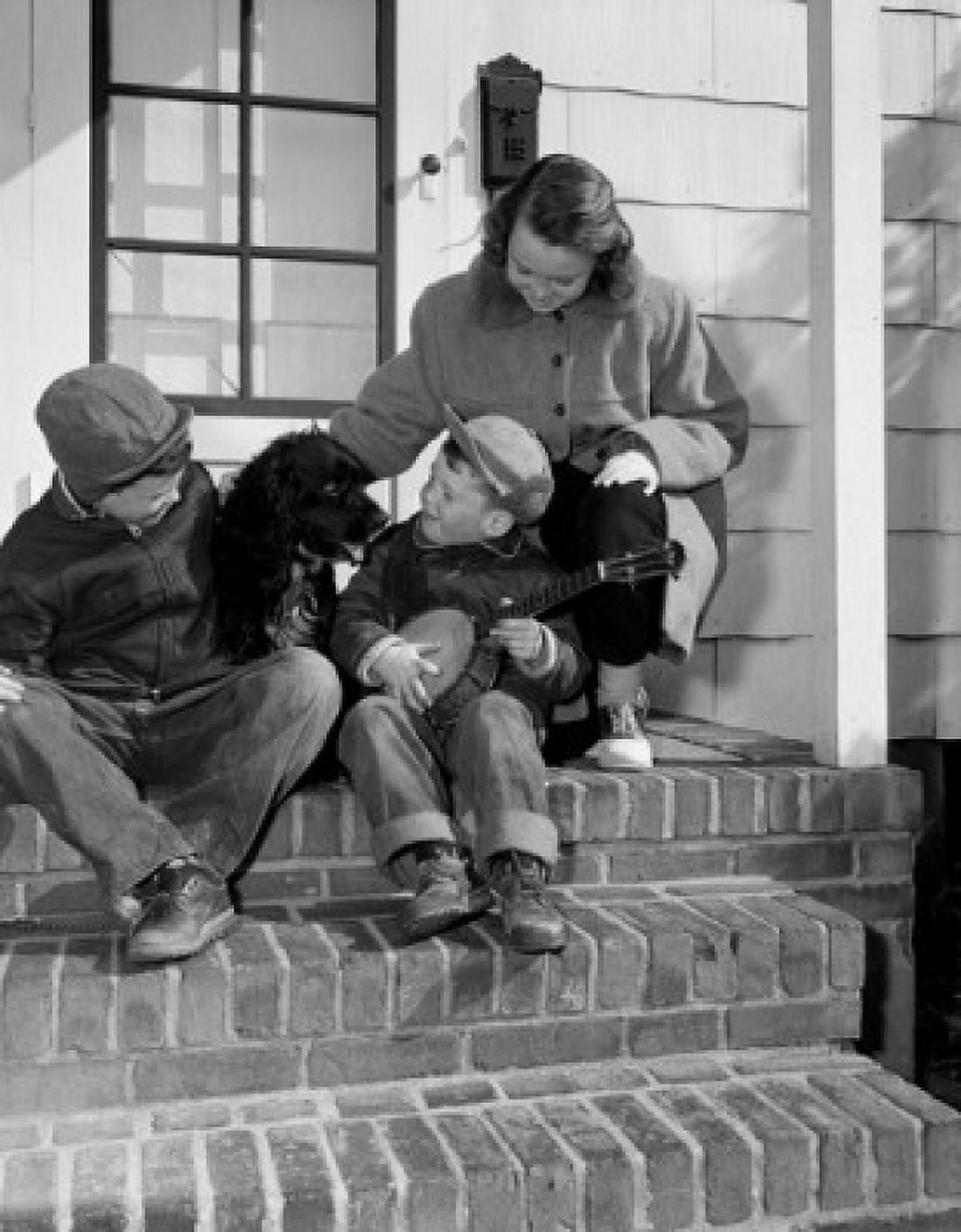 Children sitting with dog on steps Canvas Art - (18 x 24)