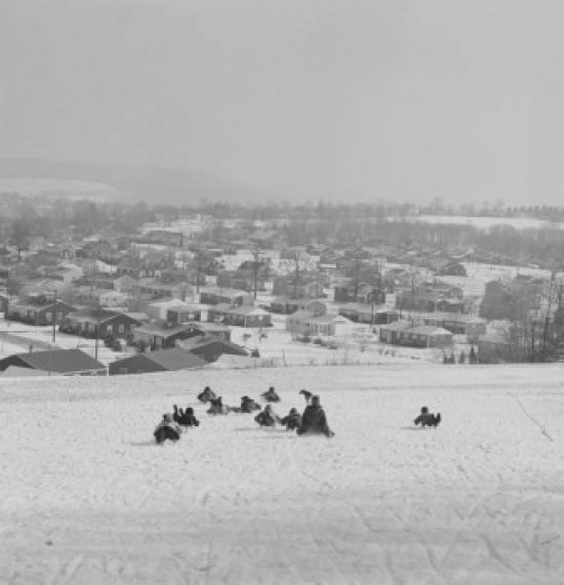 Children sledding down hill Canvas Art - (18 x 24)