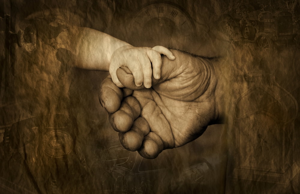 Childs Hand Holding Adult Hands Canvas Art - Corey Hochachka Design Pics (17 x 11)