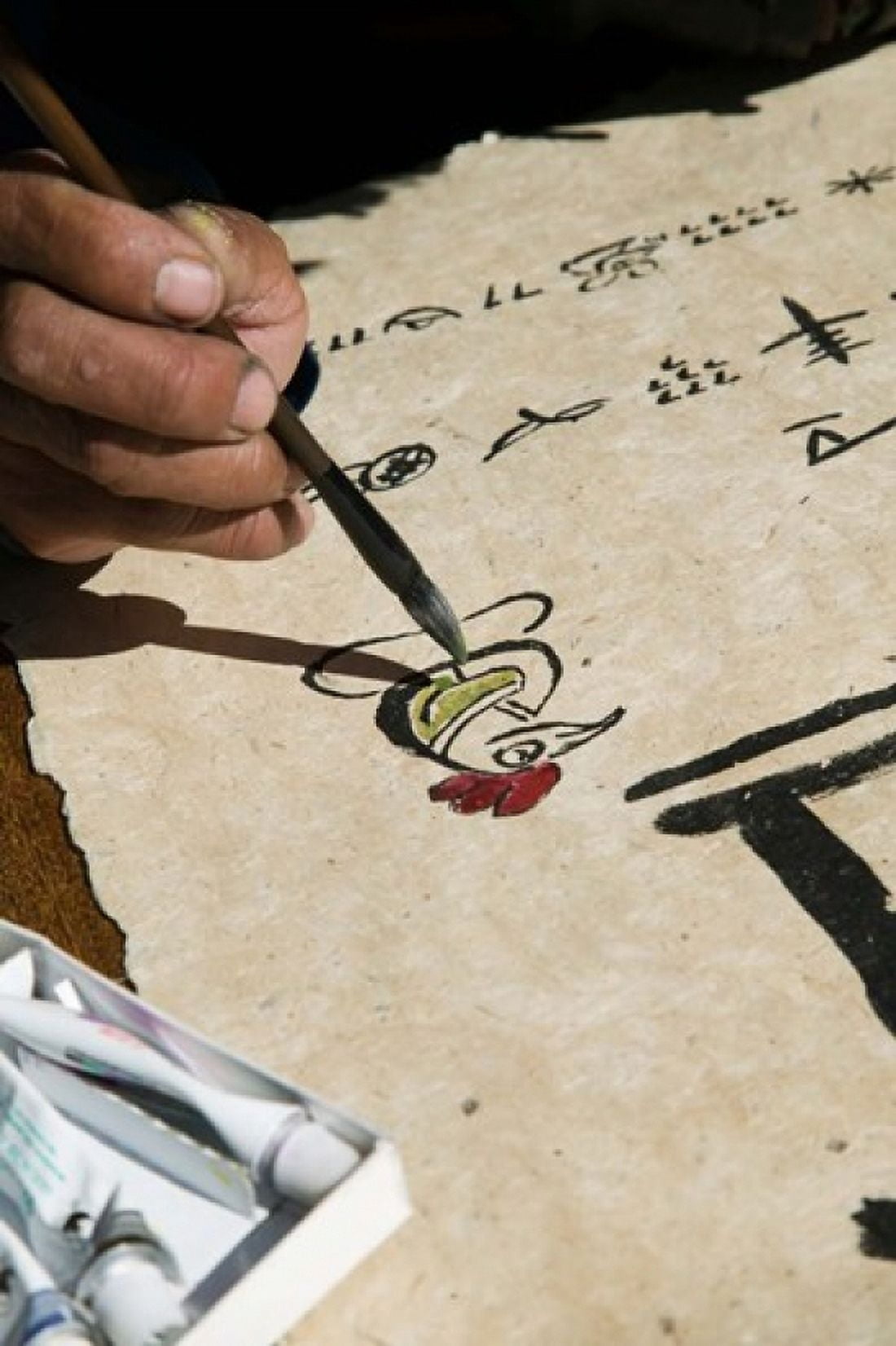 Chinese calligrapher painting calligraphy on a paper at the Dongba Place Old Town Lijiang Yunnan Province China Canvas Art - Panoramic Images (24 x 36)