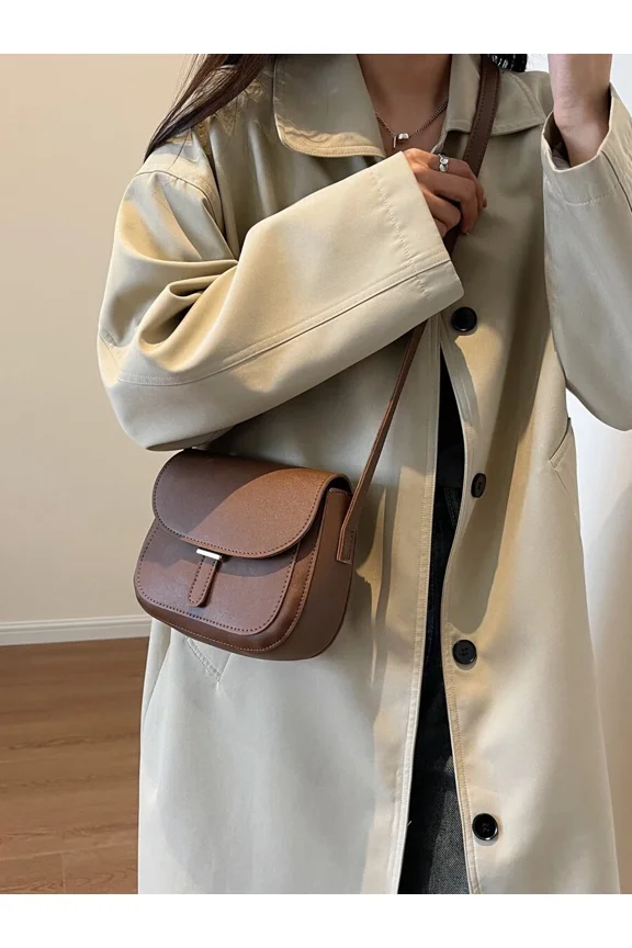 Chocolate Brown Saddle Crossbody Bag With Flap Closure And Adjustable Strap