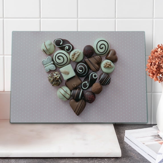 Chocolate Cutting Board, Chocolate Candies Heart Shape Composition on Pink Backdrop for St Valentines Day, Decorative Tempered Glass Cutting and Serving Board, in 3 Sizes, by Ambesonne