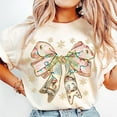 thumbnail image 1 of Christian Christmas Bow T-Shirt, Coquette Jesus Glitter Tee, Pink Nativity Scene Shirt, Bible Verse Xmas Lights Holiday Tee, 1 of 5