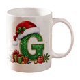 thumbnail image 1 of Christmas Alphabet Mug with Santa Hat - Ceramic Personalized A to Z Coffee Cup for Hot Cocoa Tea or Coffee, Festive Decor and Holiday Gift G, 1 of 6