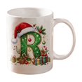 thumbnail image 1 of Christmas Alphabet Mug with Santa Hat - Ceramic Personalized A to Z Coffee Cup for Hot Cocoa Tea or Coffee, Festive Decor and Holiday Gift R, 1 of 6