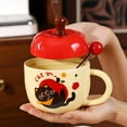 thumbnail image 1 of Christmas Apple Cartoon Ceramic Mug - Holiday Themed Hot Drink Cup with Lid & Spoon, Ideal for Cocoa/Coffee, Festive Party Gift,Red1, 1 of 9