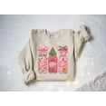 thumbnail image 1 of Christmas Dr Pepper Sweatshirt, Pink Bow Festive Holiday Shirt, Trendy Xmas Soda Sweater, Coquette Bow Coke shirt, Dr Pepper Lover Gift,Sand Color,Size L, 1 of 5
