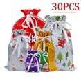 thumbnail image 1 of Christmas Drawstring Gift Bag Set, 1 of 4