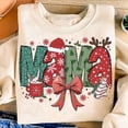 thumbnail image 1 of Christmas Mama Coquette Sweatshirt, Mama Claus Holiday Sweatshirt, Cute Xmas Tree Cake Pullover, Candy Cane Hot Cocoa Vibes, 1 of 5