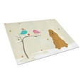 thumbnail image 1 of Carolines Treasures BB2567LCB Christmas Presents Between Friends Cocker Spaniel Red Glass Cutting Board, Large, 1 of 2