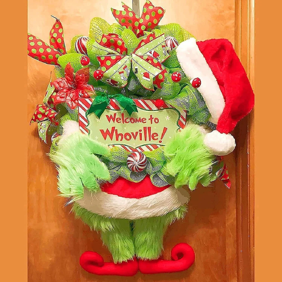 Christmas Wreath for Front Door, Green Monster Whimsical Holiday Hanging Decor with Plush Arms and Legs, Red Santa Hat, Bow and Candy Ornaments